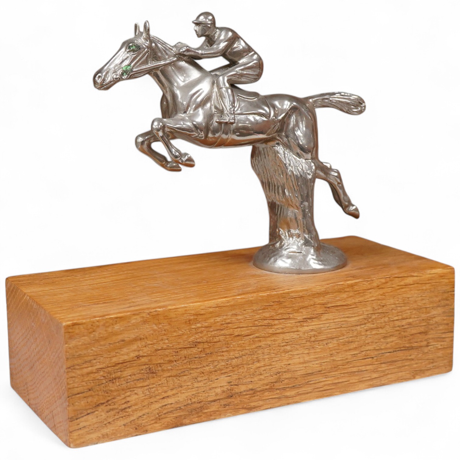 A chrome plated ‘jockey and horse’ car mascot, mounted, 18cm tall